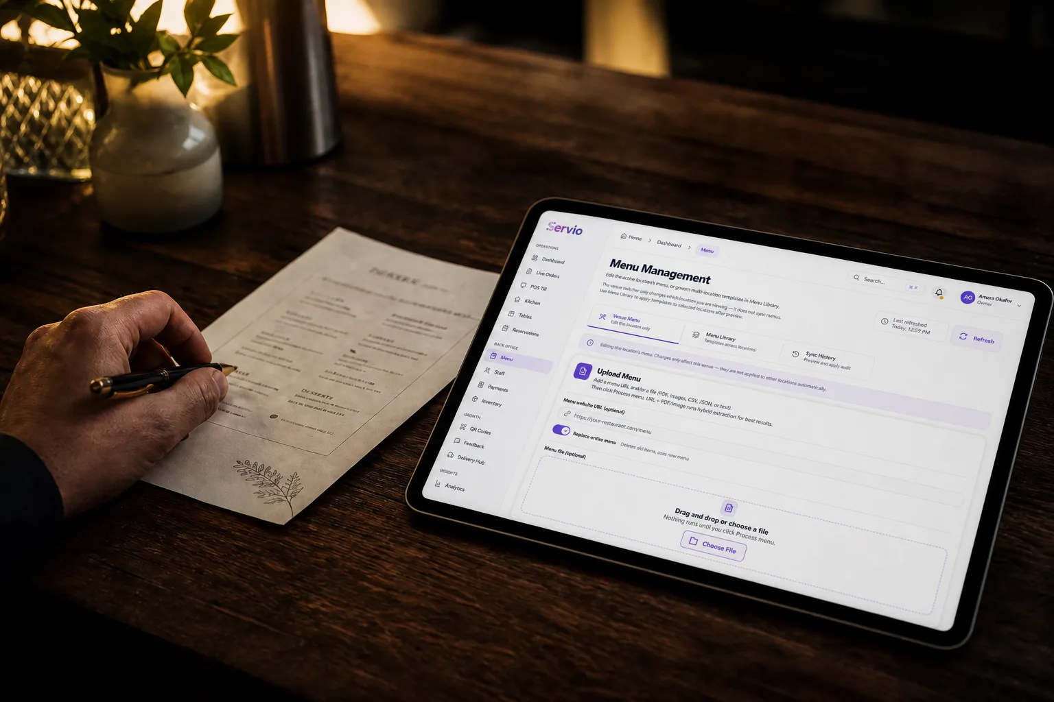 A printed menu beside a tablet showing the rebuilt digital menu in Servio